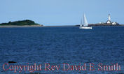 Sailboat and Boston Light